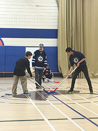 MSD students playing floor hockey